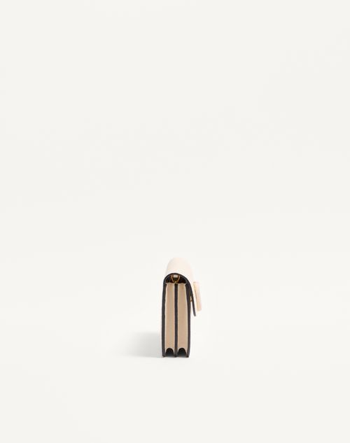Valentino Garavani - Vlogo Signature Grainy Calfskin Wallet With Chain - Light Ivory - Woman - Clutches